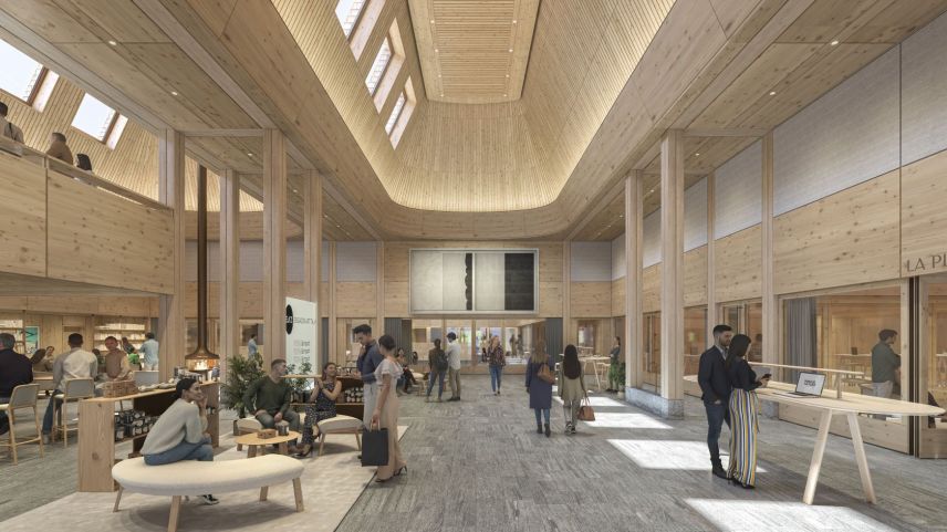 Blick in die zukünftige Lobby des InnHub La Punt. Die nachhaltige Bauweise des Innovationscampus wird durch den Einsatz von Bündner Holz unterstrichen. Bild: Foster + Partners